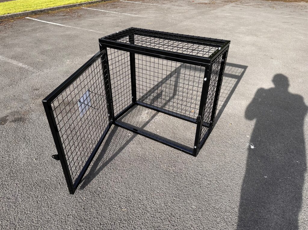 Two Gas Bottle Cages - Also showing how the cage door opens.